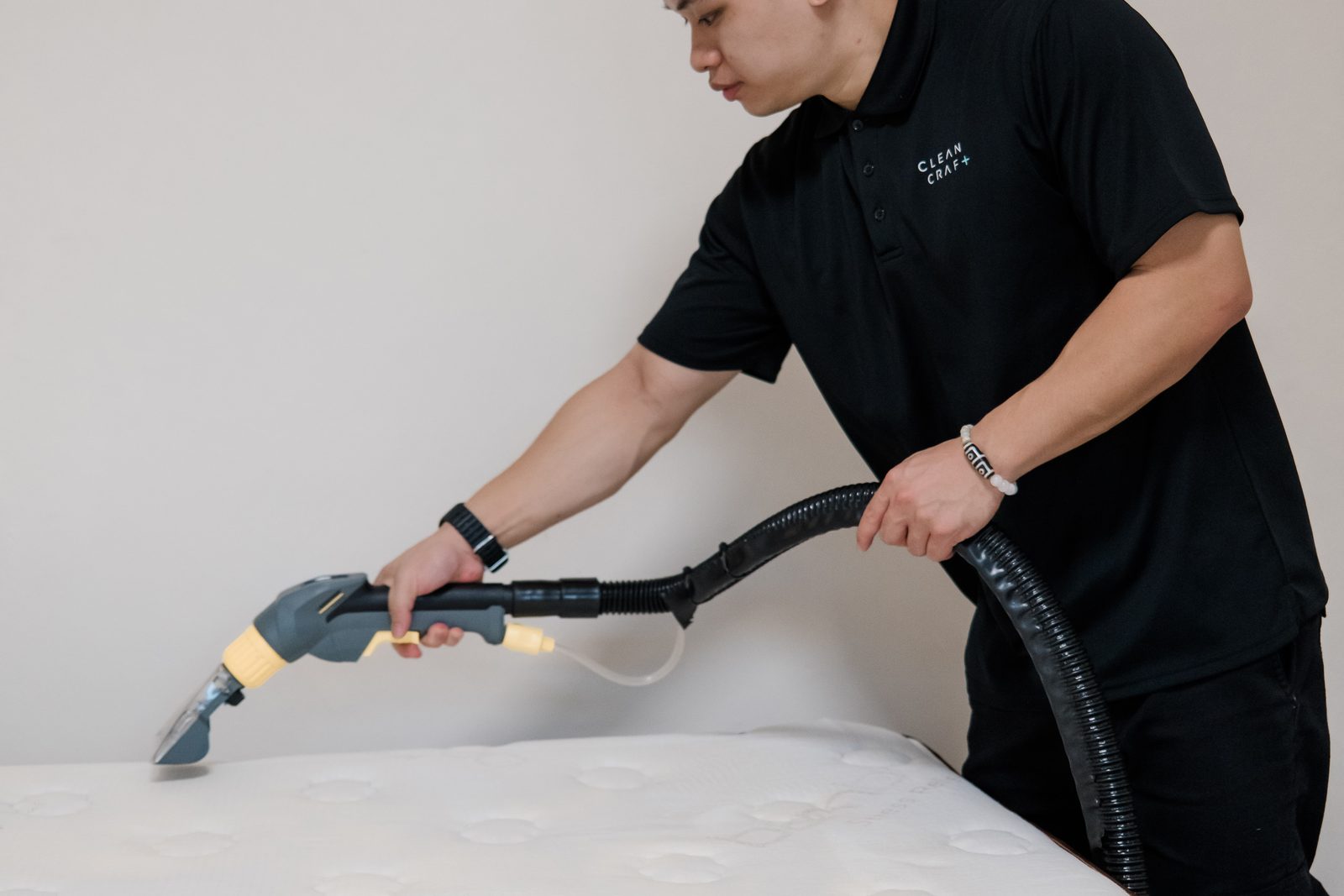 Cleancraft technician wet-extracting a mattress